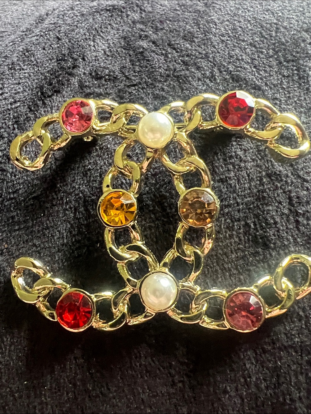 Gold-Tone Crystal Chain Logo Brooch - Multicolor